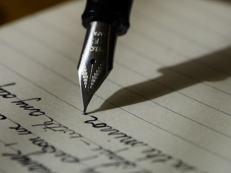 Job seeker writing a tailored resume